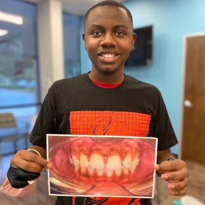 Teen Holding Braces Before & After 1